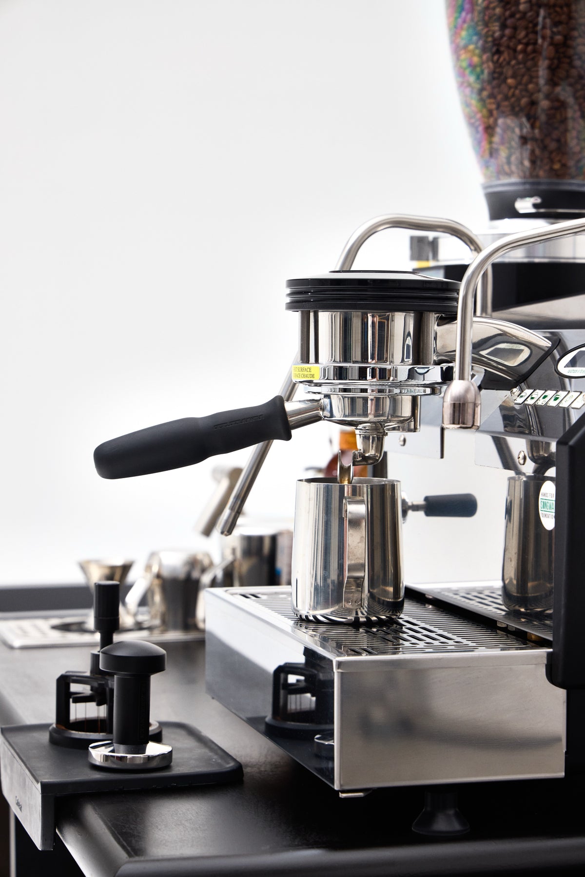 La Marzocco GS3 espresso machine with portafilter locked in